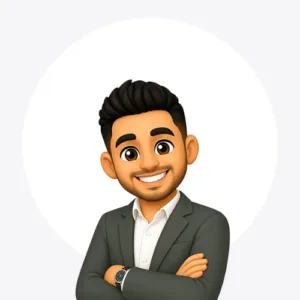 Cartoon avatar of a smiling man with dark hair in a gray suit, white shirt, arms crossed.